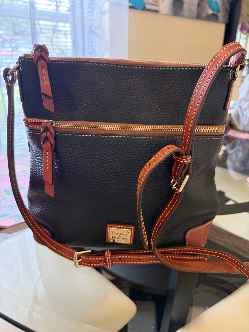 Dooney & Bourke Black Pebble Leather Crossbody with Brown Trim and Gold Hardware